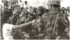 Girl Giving Flower during EDSA Revolution